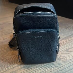 Coach Gotham Sling Pack 13
Black Leather